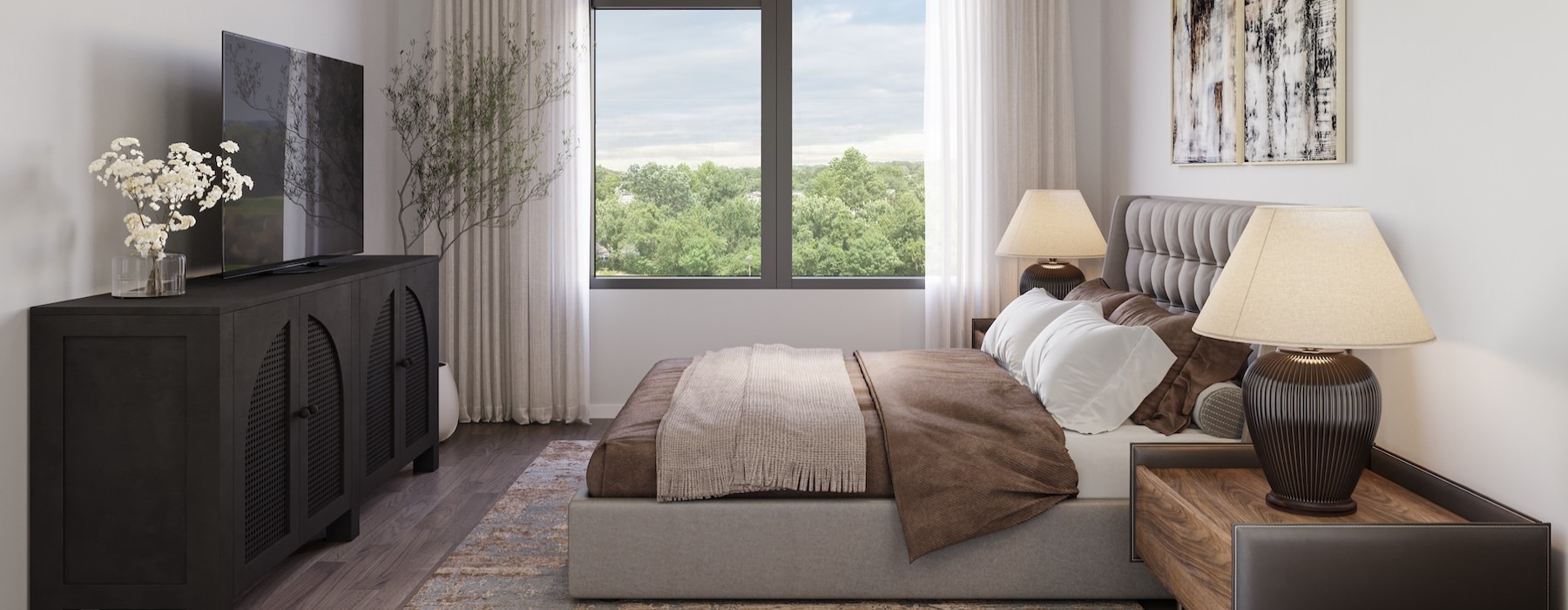 a bedroom with a bed, dresser and a tv