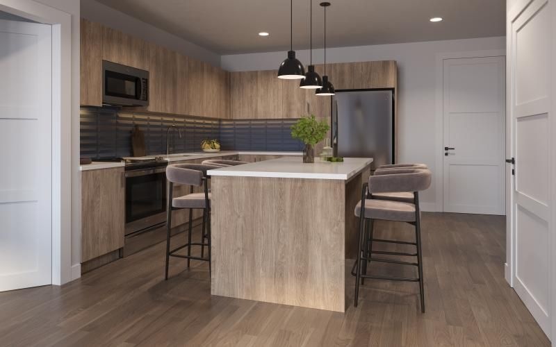 a kitchen with an island and chairs