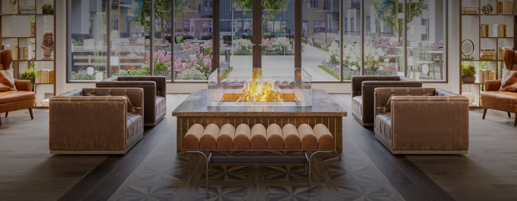 a clubroom with benches, chairs and a fire pit